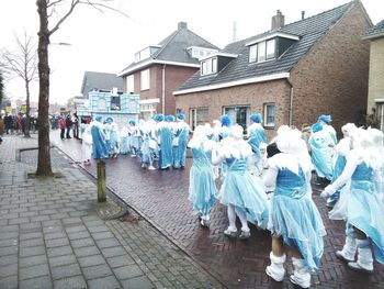 Panoramic view of people on street