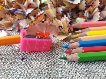 High angle view of multi colored pencils on table