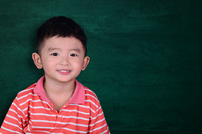 Portrait of cute boy smiling