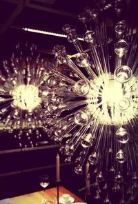 Low angle view of illuminated chandelier