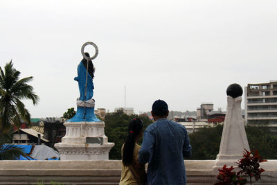 Rear view of statue against clear sky