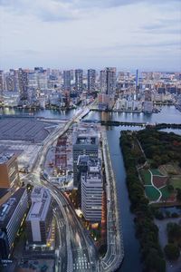 High angle view of modern buildings against sky in city