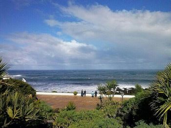 Scenic view of sea against cloudy sky