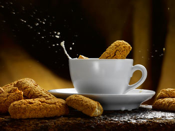 Close-up of coffee cup on table