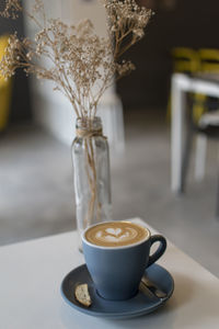 Close-up of cappuccino on table