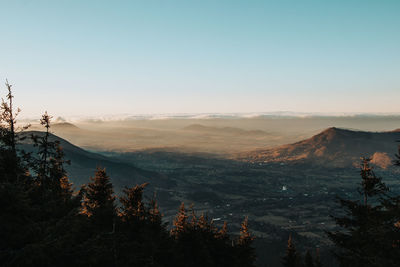 Scenic view of landscape against sky during sunset