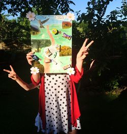 Full length of woman standing in park