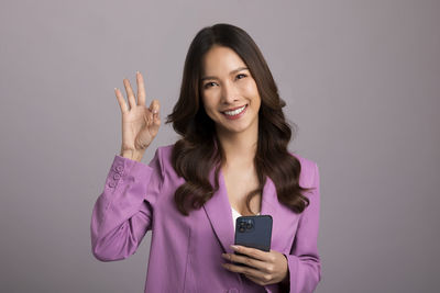 Young woman using mobile phone