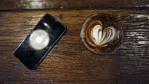 Close-up of cappuccino on table