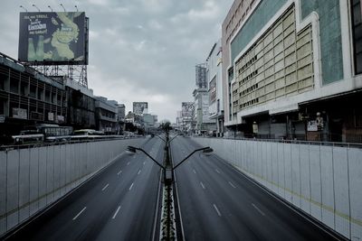 Road in city against sky