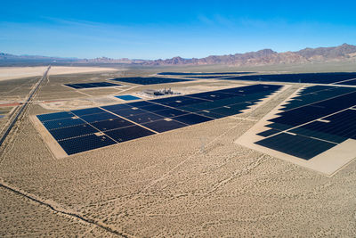 Solar panel produces green, environmentaly friendly energy from the setting sun. aerial view 