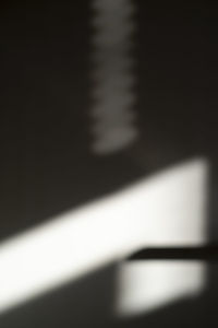 Close-up of curtain on table at home