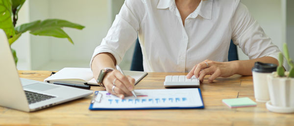 Woman working on table