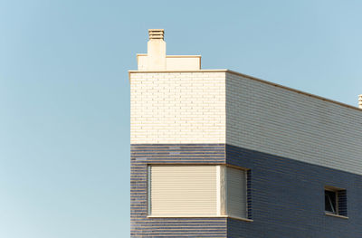 Low angle view of building against clear sky