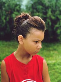 Portrait of boy looking at park