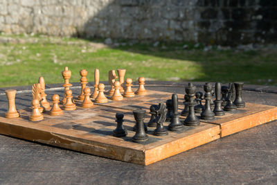 Close-up of chess board on table