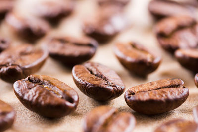 Close-up of coffee beans on table