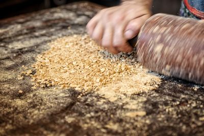 Close-up of person preparing food