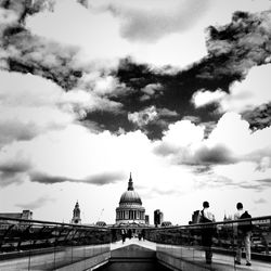 Low angle view of historical building against cloudy sky