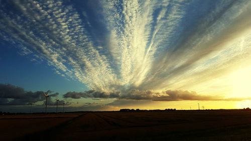 Scenic view of landscape at sunset