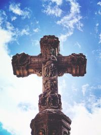 Low angle view of old building against blue sky