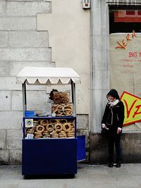 Woman standing in city