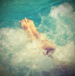 High angle view of person swimming in sea