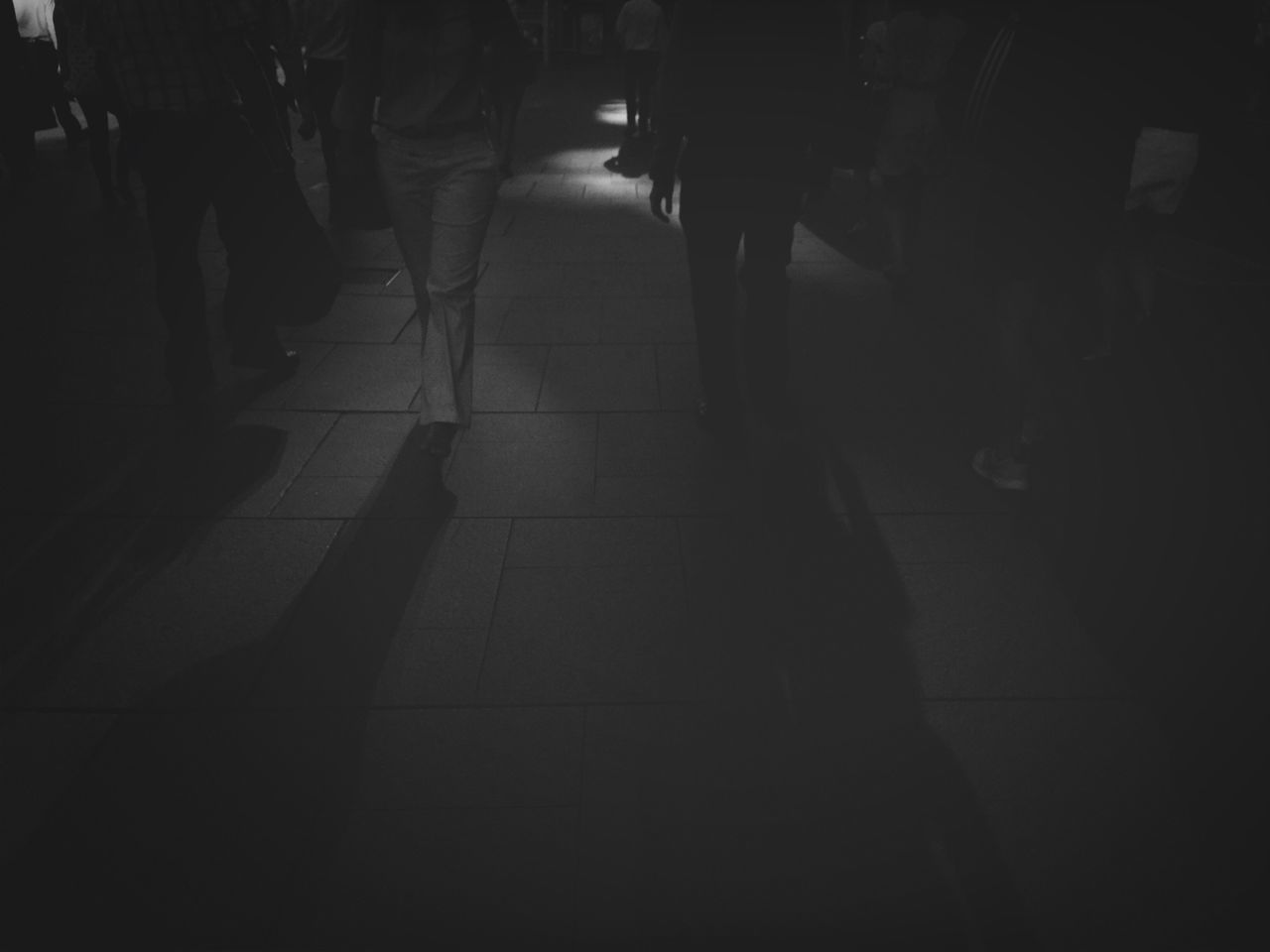 walking, men, person, lifestyles, shadow, street, the way forward, city life, night, sunlight, city, silhouette, leisure activity, group of people, unrecognizable person, large group of people, dark, incidental people, rear view