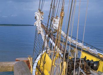 Panoramic view of sailboat by sea against sky