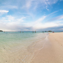 Scenic view of beach against sky