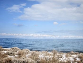 Scenic view of calm sea against sky