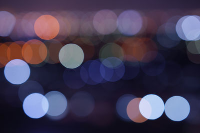 Defocused image of illuminated lights at night