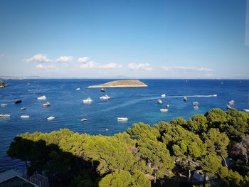 High angle view of sea against blue sky
