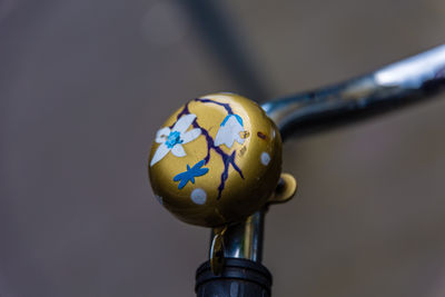 Close-up of stickers on bicycle bell