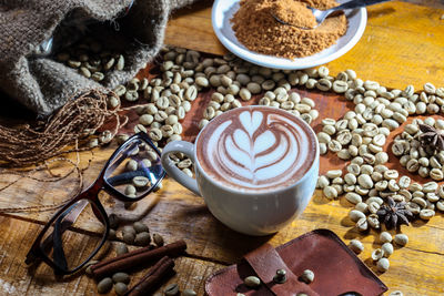 High angle view of coffee cup on table