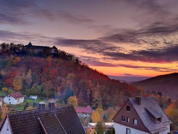 High angle view of townscape against sky during sunset