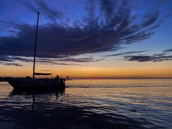 A boat floating in a sea. taken with my perspective in mind.