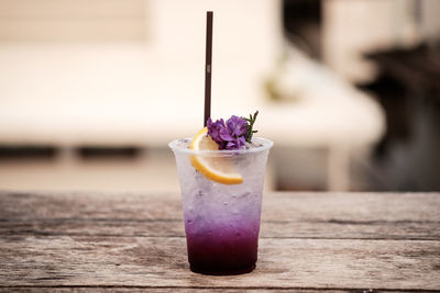 Close-up of drink on glass table