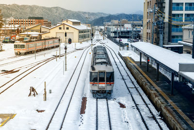 High angle view of train on railroad tracks during winter