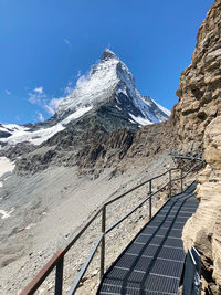 Scenic view of snowcapped mountains against sky, trail to the matterhorn base camp 