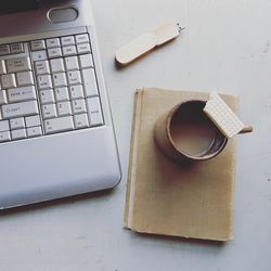 High angle view of coffee cup on table