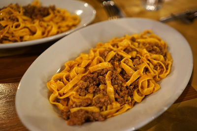 Tagliatelle al ragu, bolognese pasta with ragu with onion, garlic, leek, bay leaf, tomatoes and wine