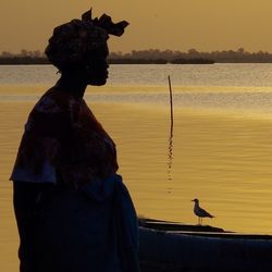 Scenic view of sea at sunset