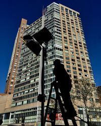 Low angle view of buildings against clear sky