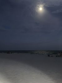 Scenic view of sea against sky at night