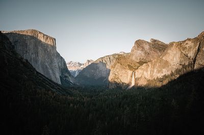 Scenic view of rocky mountains against clear sky