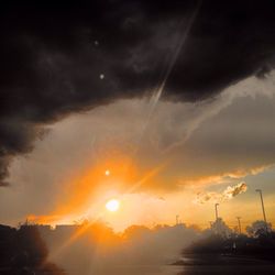 Scenic view of cloudy sky at sunset