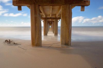 Built structure against cloudy sky