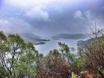 Scenic view of sea against cloudy sky