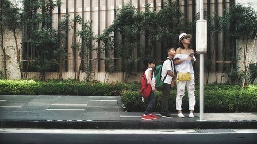 Woman walking on road